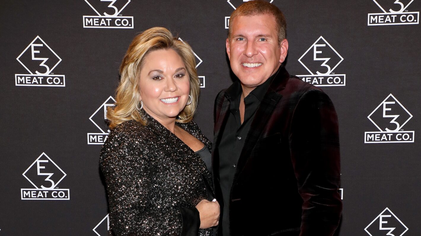 Julie Chrisley (L) and Todd Chrisley attend the grand opening of E3 Chophouse Nashville on November 20, 2019