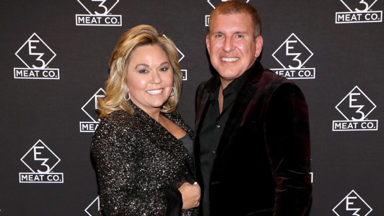 Julie Chrisley (L) and Todd Chrisley attend the grand opening of E3 Chophouse Nashville on November 20, 2019