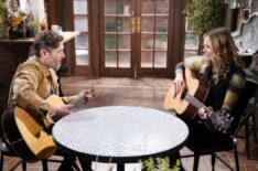 Michael Graziadei and Cait Fairbanks playing guitar on 'The Young and the Restless'