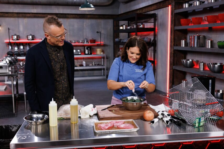 Host Brian Malarkey checks in on chef Leslie Raney Garetto as she season with salt packets as seen on Cutthroat Kitchen Knives Out OLYJ1A1A04_0071