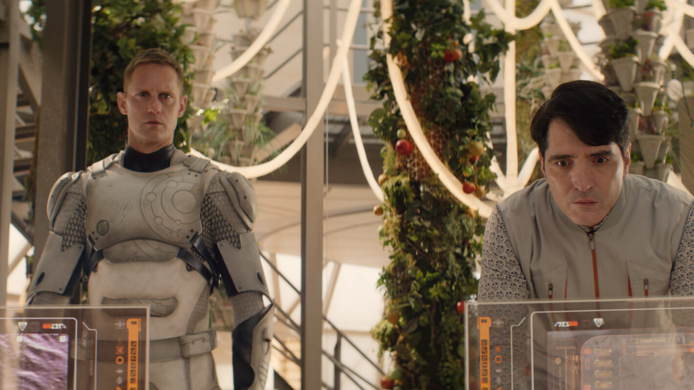 Alexander Skarsgard and David Dastmalchian in Murderbot