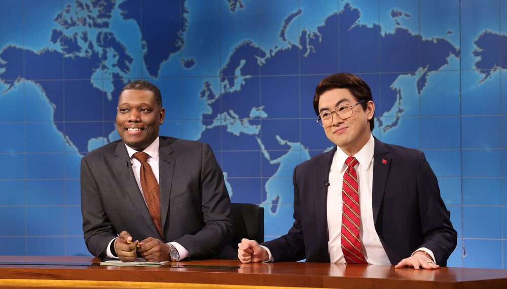 Anchor Michael Che and Bowen Yang as Chen Biao during Weekend Update on Saturday, April 12, 2025