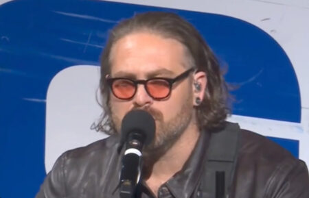 Adam David performing 