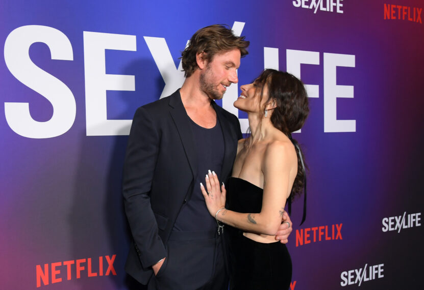 Adam Demos and Sarah Shahi attend Netflix's