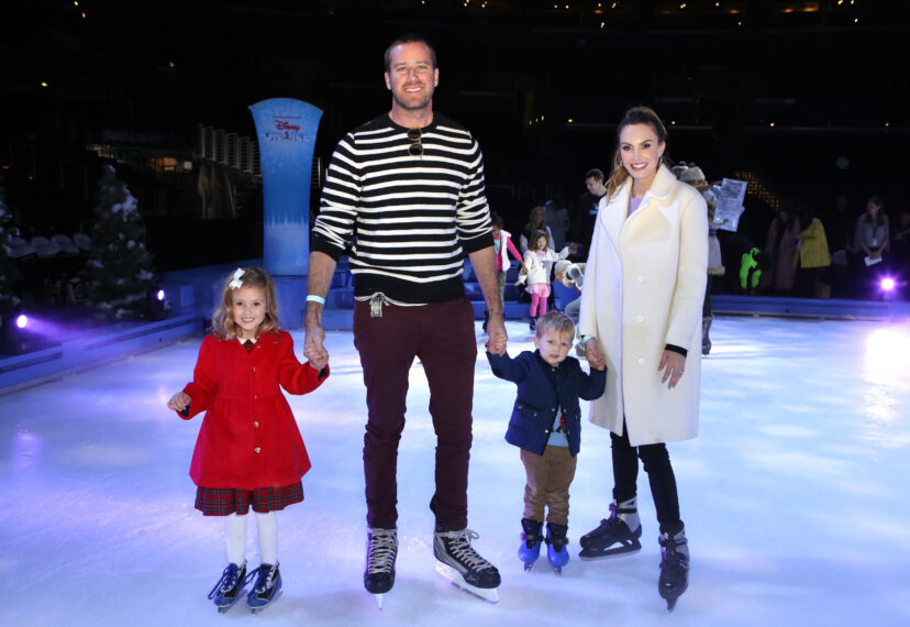 Armie Hammer and Elizabeth Chambers with children Harper and Ford attend Disney On Ice