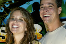 Survivor All-star million dollar winner Amber Brkich and 'Boston Rob' Mariano pose for photos after the Survivor All-stars Finale