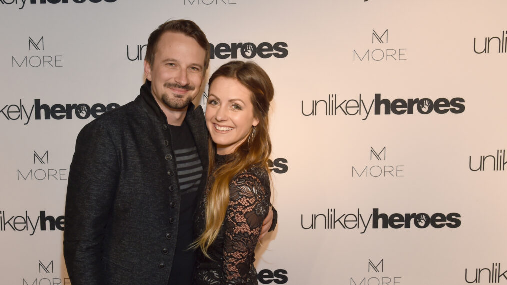 Evan Bass and Carly Waddell from TV show The Bachelor take photos on carpet for Unlikely Heroes hosts, Night of Freedom, A Tribute to the Legend George Michael