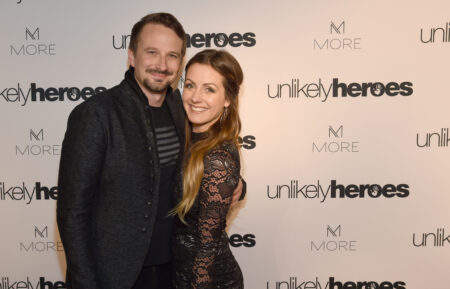 Evan Bass and Carly Waddell from TV show The Bachelor take photos on carpet for Unlikely Heroes hosts, Night of Freedom, A Tribute to the Legend George Michael