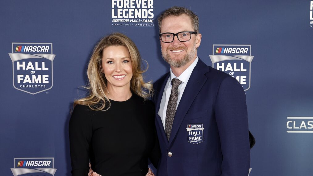 NASCAR Hall of Famer Dale Earnhardt Jr. and his wife, Amy Earnhardt pose for photos on the red carpet prior to the 2024 NASCAR Hall of Fame Induction Ceremony at Charlotte Convention Center on January 19, 2024 in Charlotte, North Carolina.