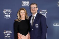 NASCAR Hall of Famer Dale Earnhardt Jr. and his wife, Amy Earnhardt pose for photos on the red carpet prior to the 2024 NASCAR Hall of Fame Induction Ceremony at Charlotte Convention Center on January 19, 2024 in Charlotte, North Carolina.