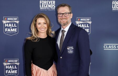 NASCAR Hall of Famer Dale Earnhardt Jr. and his wife, Amy Earnhardt pose for photos on the red carpet prior to the 2024 NASCAR Hall of Fame Induction Ceremony at Charlotte Convention Center on January 19, 2024 in Charlotte, North Carolina.