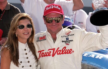 Driver Dale Earnhardt Sr. poses with his wife Teresa and the trophy after winning the IROC Race during the Brickyard 400, part of the NASCAR Winston Cup Series on August 6, 199 at the Indianapolis Motor Speedway in Indianapolis, Indiana.