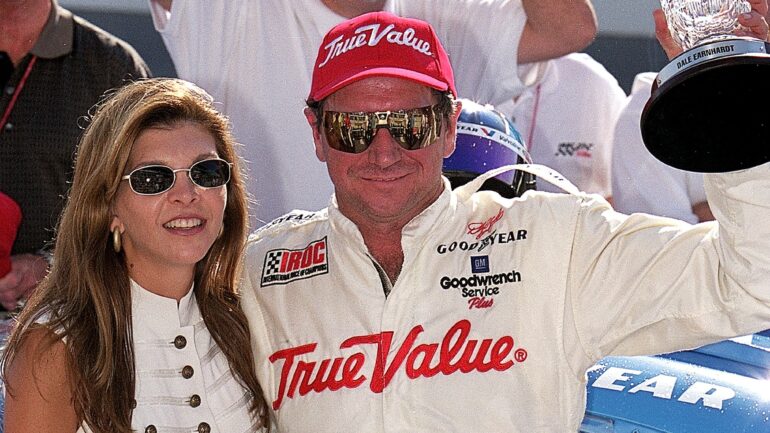 Driver Dale Earnhardt Sr. poses with his wife Teresa and the trophy after winning the IROC Race during the Brickyard 400, part of the NASCAR Winston Cup Series on August 6, 199 at the Indianapolis Motor Speedway in Indianapolis, Indiana.