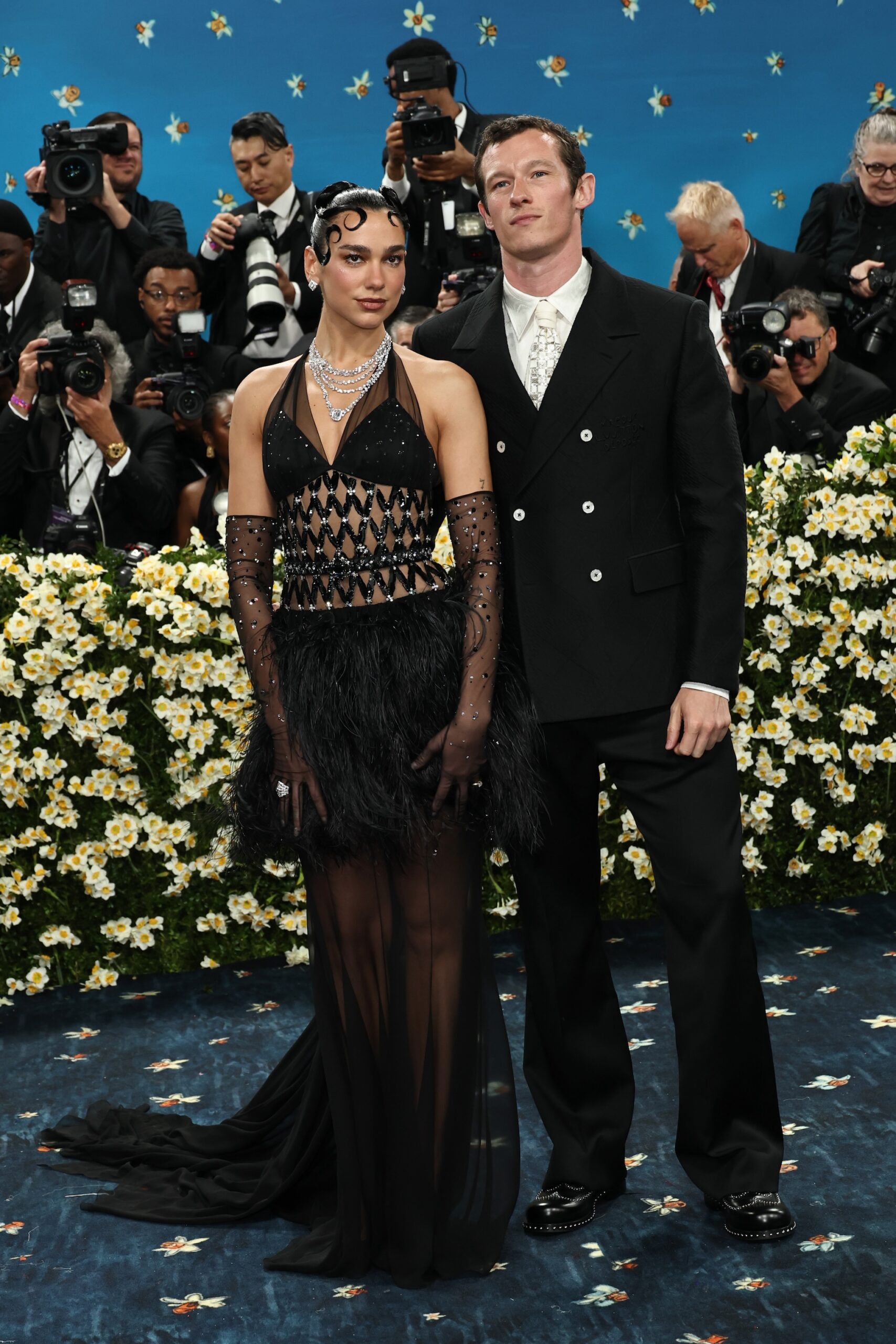 Dua Lipa and Callum Turner attend the 2025 Met Gala Celebrating 
