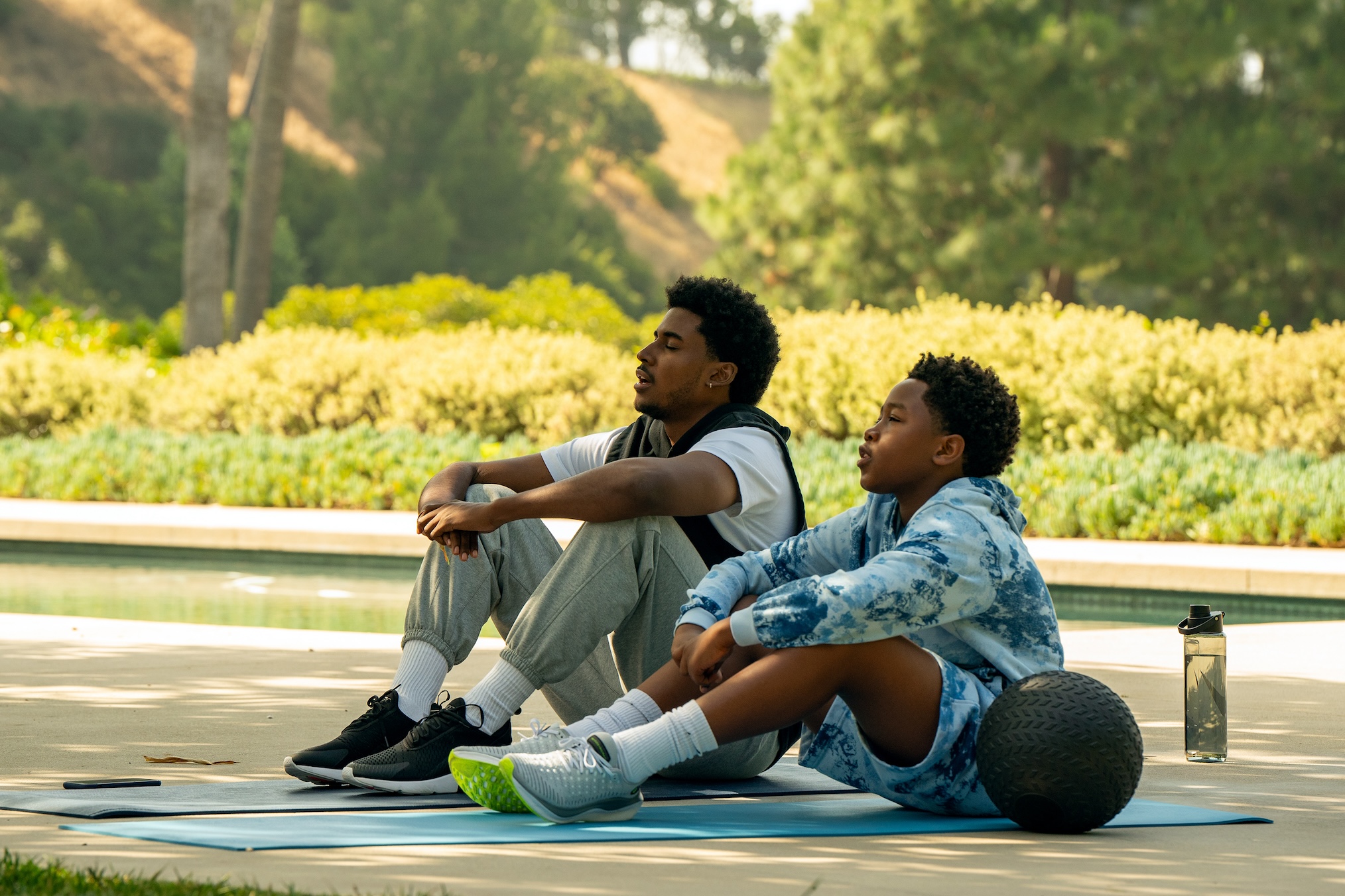 Michael Cooper Jr. as Justin Edwards and Marvin Winans III as Jaden Edwards in Episode 104 of Forever