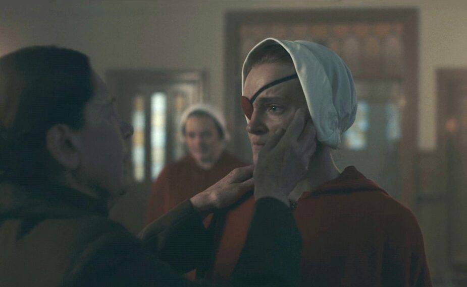 Ann Dowd as Aunt Lydia, Madeline Brewer as Janine, and Elisabeht Moss as June in 'The Handmaid's Tale' Season 6 Episode 8, 'Exodus'