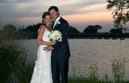 Henry and Jenna Hager pose for photographs along the lake at Prairie Chapel Ranch following their wedding ceremony May 10, 2008