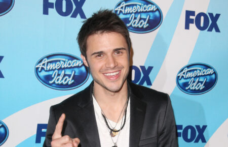 American Idol season 8 winner Kris Allen poses in the press room during the American Idol Season 8 Grand Finale