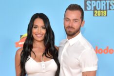 Nikki Bella and Artem Chigvintsev attend Nickelodeon Kids' Choice Sports 2019 at Barker Hangar on July 11, 2019 in Santa Monica, California.
