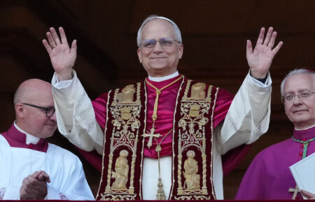 The newly elected Pontiff, Pope Leo XIV is seen for the first time from the Vatican balcony on May 8, 2025 in Vatican City, Vatican.