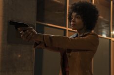 Rachel Hilson with gun in Duster