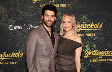 Steven Krueger and Candice King attend the 