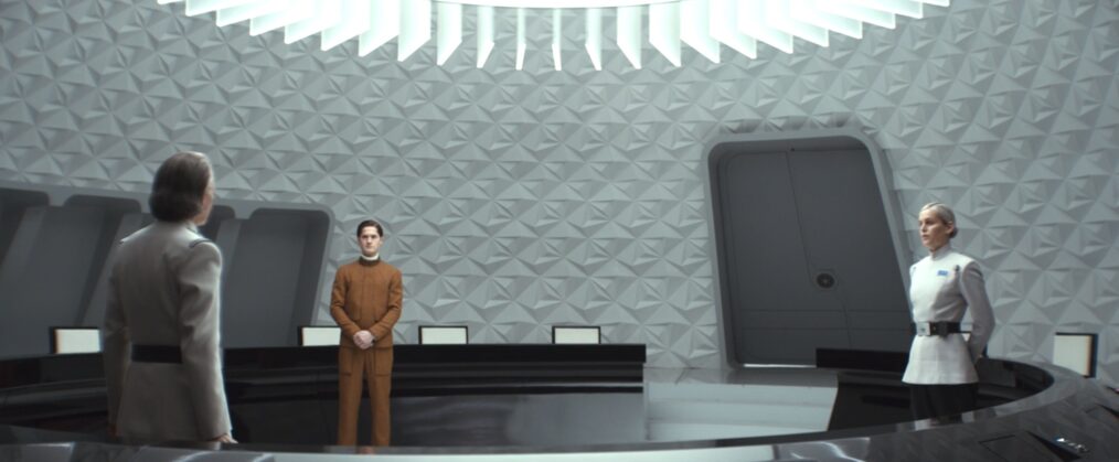 Kyle Soller as Syril Karn and Denise Gough as Dedra Meero in Andor Season 2