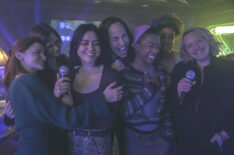 Madeline Brewer, Alexis Bledel, Nina Kiri, Amanda Brugel, Samira Wiley, Bahia Watson, and Elisabeth Moss singing in 'The Handmaid's Tale' series finale