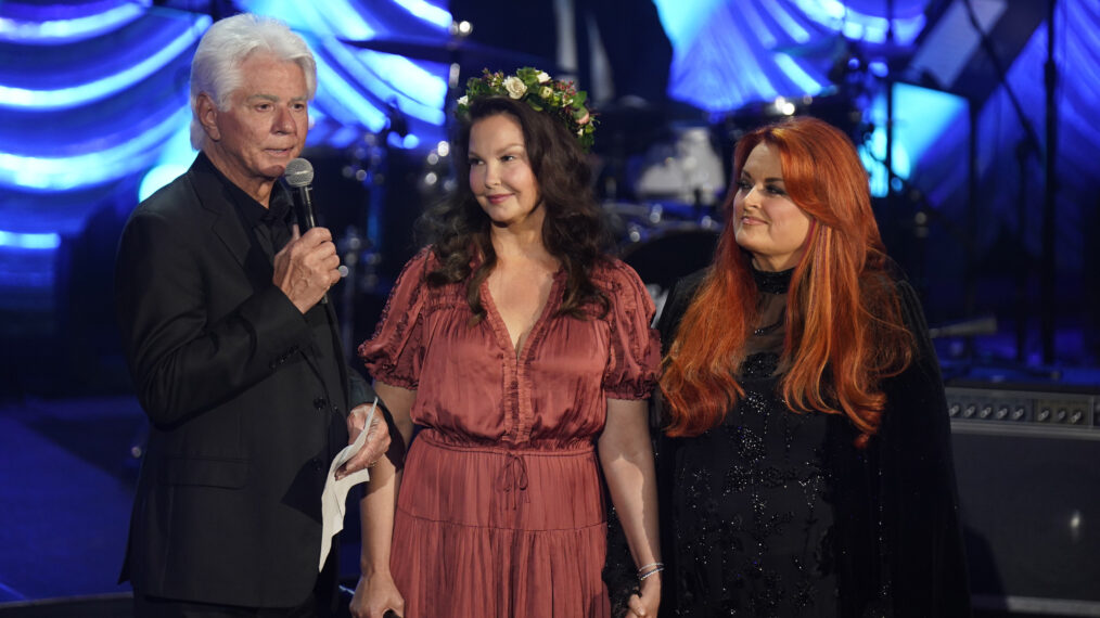 Larry Strickland, Ashley Judd, and Wynonna Judd speak onstage for Naomi Judd: 'A River Of Time' Celebration at Ryman Auditorium on May 15, 2022