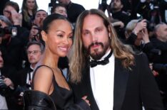 Zoe Saldana and Marco Perego attend the 'Mission Impossible - The Final Reckoning' red carpet at the 78th annual Cannes Film Festival at Palais des Festivals on May 14, 2025 in Cannes, France.