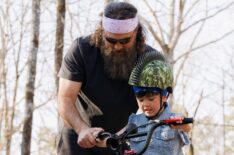 Willie Robertson with his grandchild on Duck Dynasty The Revival