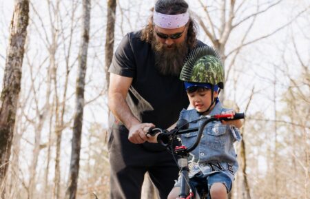 Willie Robertson with his grandchild on Duck Dynasty The Revival