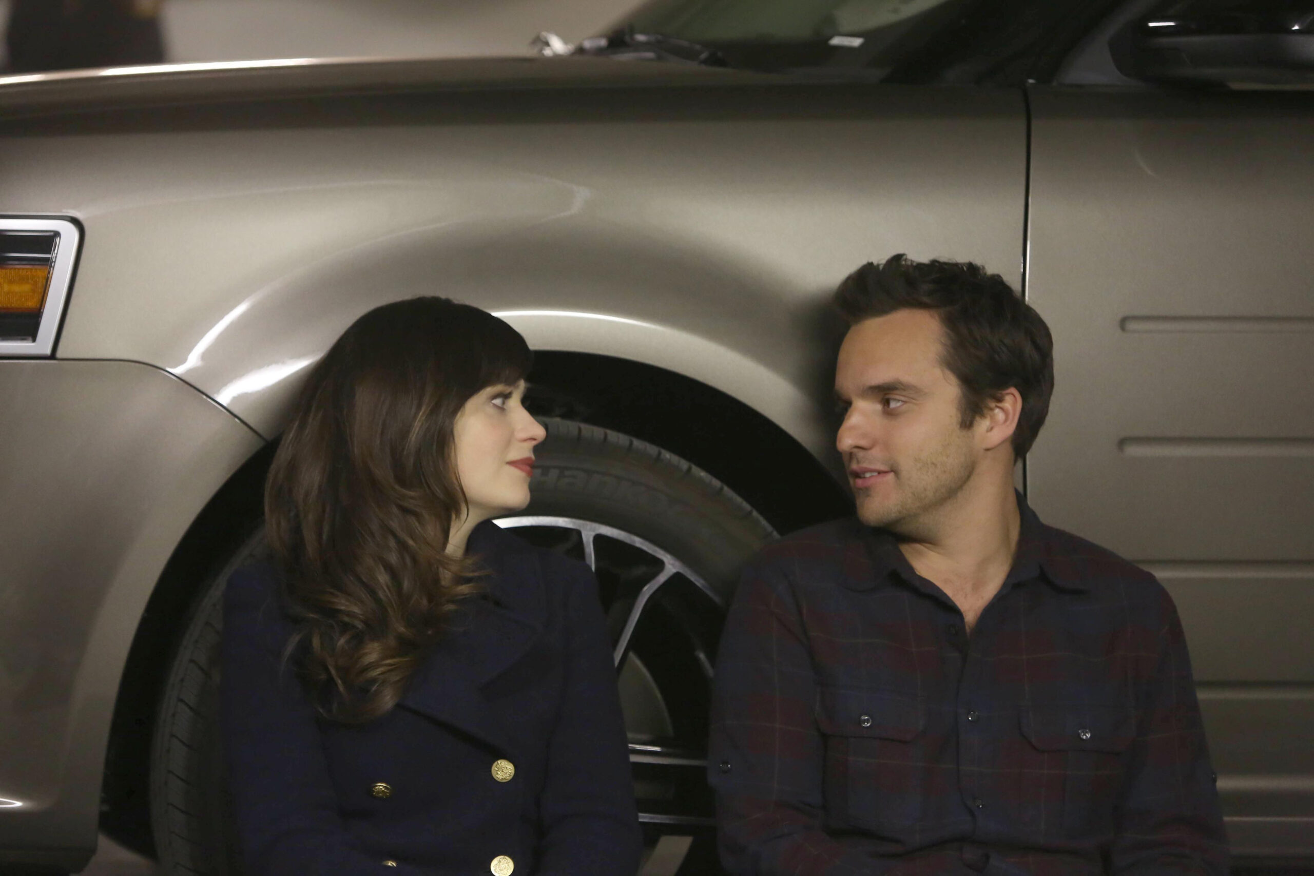 Zooey Deschanel and Jake Johnson as Jess and Nick in New Girl