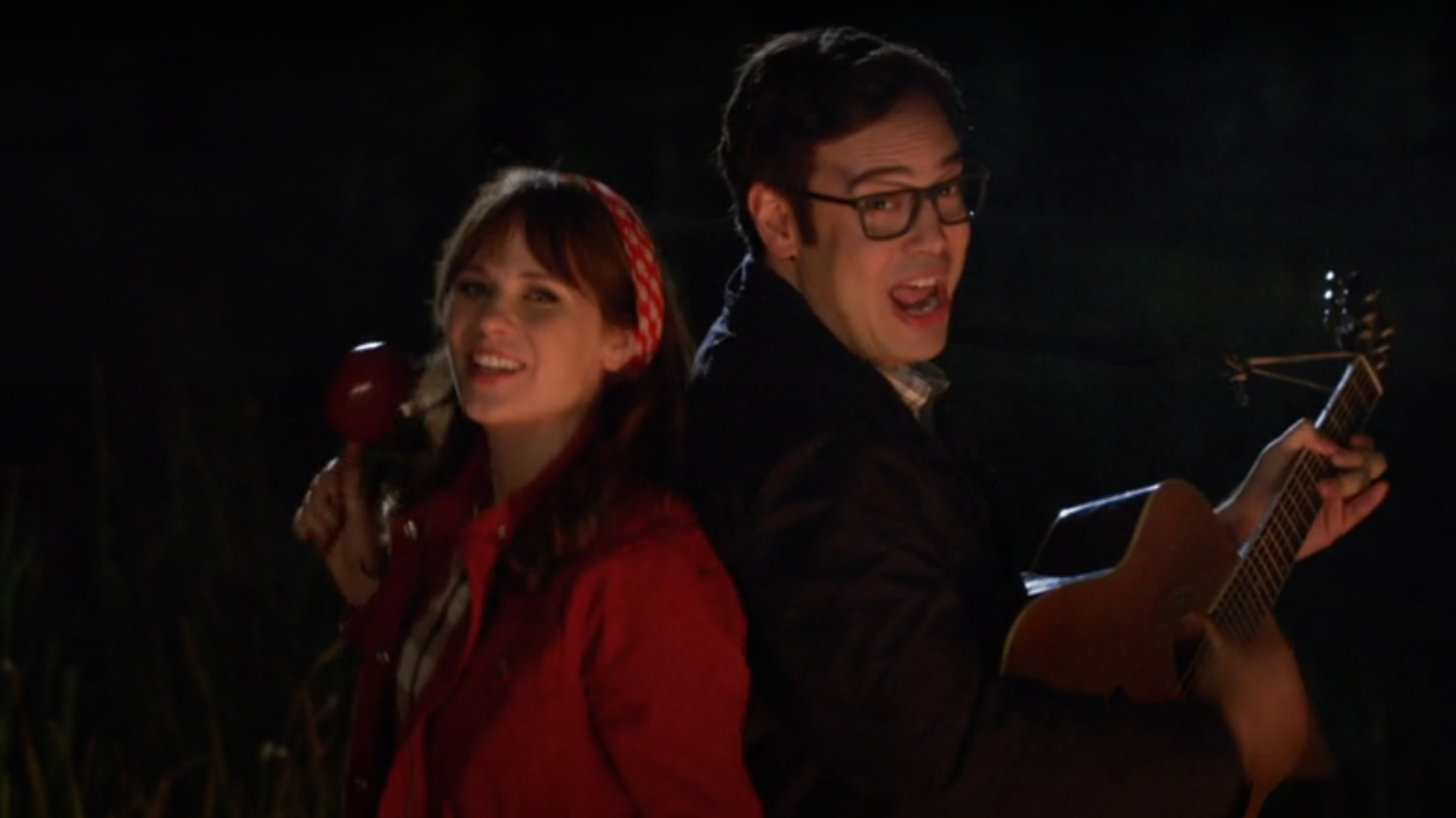 Zooey Deschanel and Nelson Franklin as Jess and Robby in New Girl