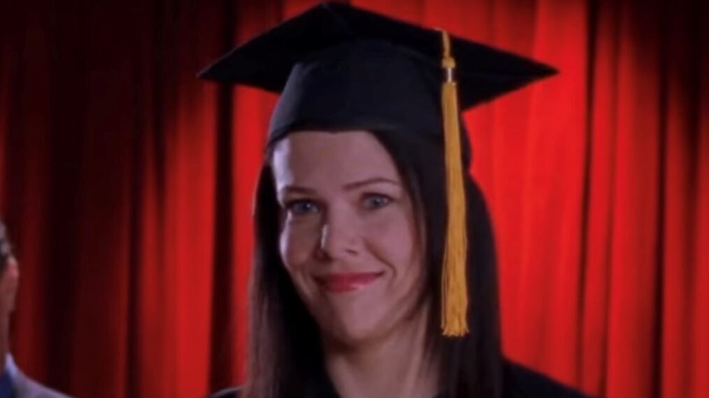 Lauren Graham at her graduation as Lorelai wearing a cap and gown