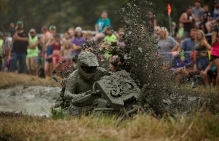 Muddy ATV Rider