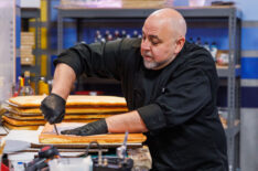 Duff Goldman works on elements for the Alien Invasion bake, as seen in Super Mega Cakes, Season 1.