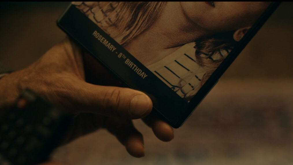 David Morse as Harris Sinclair holds a photo of Rosemary Sinclair in We Were Liars