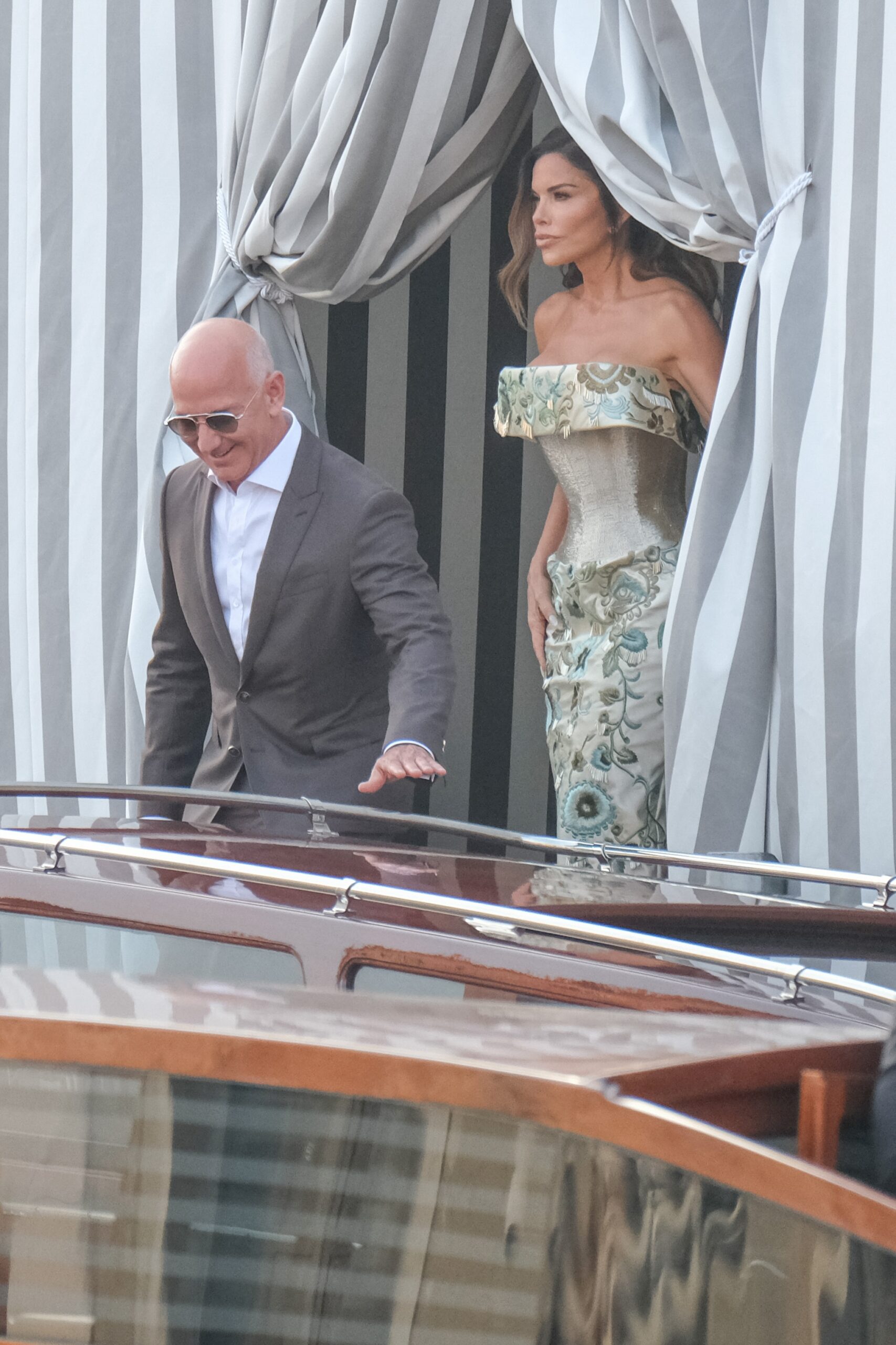 Jeff Bezos and Lauren Sanchez leave the Aman Hotel to go to dinner with guests ahead of their wedding, on June 26, 2025 in Venice, Italy.