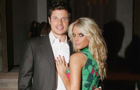 Singers Jessica Simpson and husband Nick Lachey attend the 
