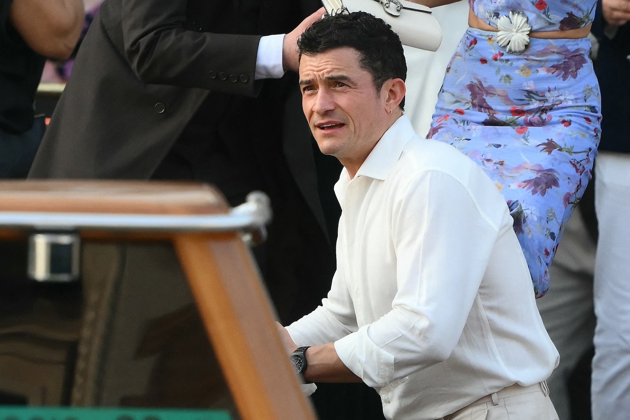 British actor Orlando Bloom and guests get on a taxi boat at the Gritti Palace Hotel ahead of the wedding of Amazon's founder Jeff Bezos with Lauren Sanchez in Venice on June 26, 2025