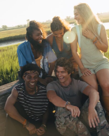 (L to R) Jonathan Daviss as Pope, Carlacia Grant as Cleo, Chase Stokes as John B, Madison Bailey as Kiara, Madelyn Cline as Sarah Cameron in season 5 of Outer Banks.