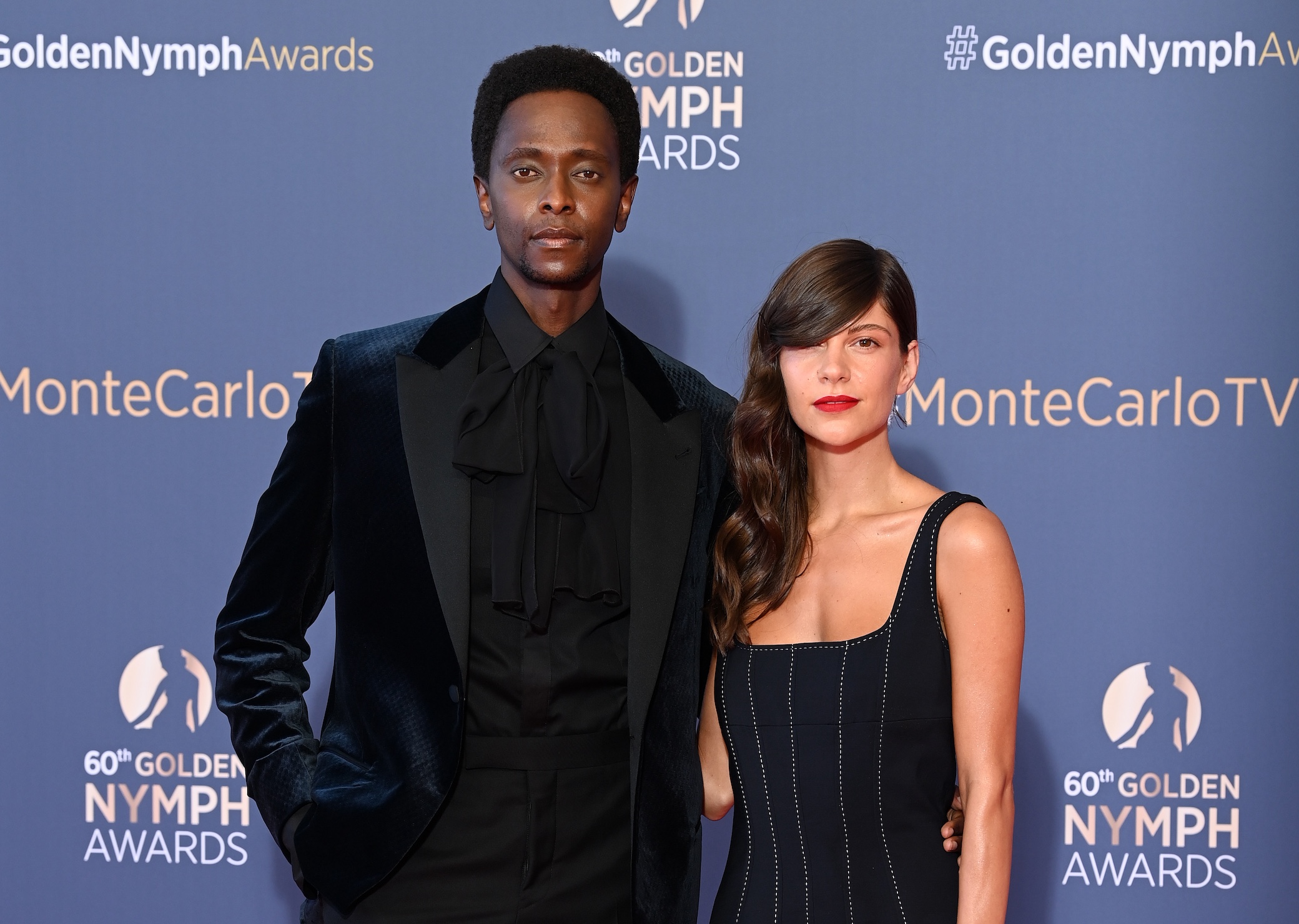Edi Gathegi and Adriana Marinescu arrive at the closing ceremony of the 60th Monte Carlo TV Festival