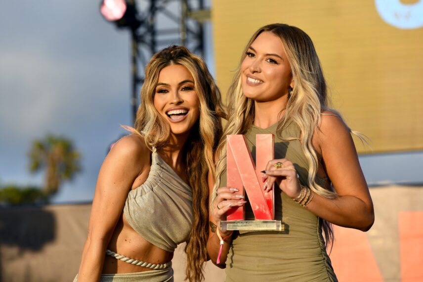 Chrishell Stause and Madison Errichiello are seen onstage during Netflix Summer Break at Santa Monica Pier on July 17, 2025 in Santa Monica, California.