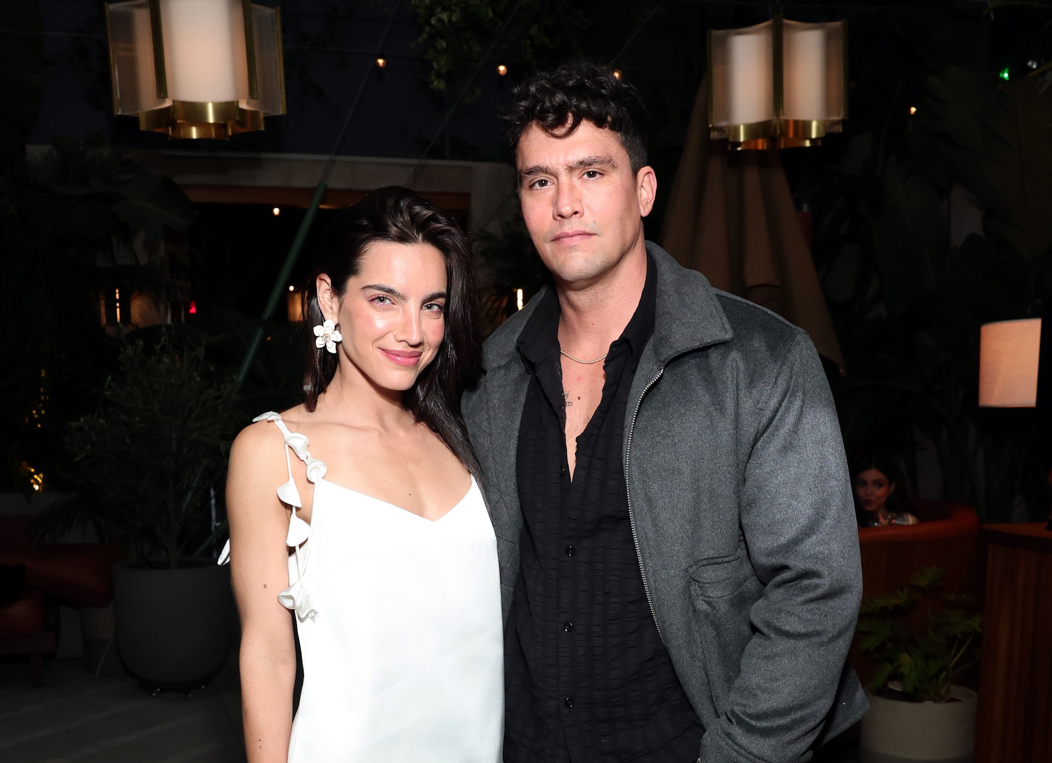 Maria Gabriela de Faria and Christian McGaffney attend a cocktail party