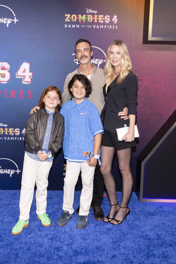Reid Scott and his family attend the 'Zombies 4' Los Angeles premiere in July 2025.