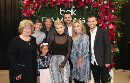 Faye Chrisley, Chloe Chrisley, Savannah Chrisley, Julie Chrisley, Chase Chrisley, Grayson Chrisley, Todd Chrisley and Nic Kerdiles pose during a personal appearance by Savannah Chrisley at Belk at Cool Springs Galleria Mall