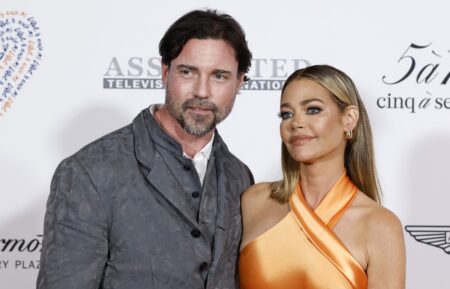 Aaron Phypers and Denise Richards attend the 30th Annual Race To Erase MS Gala at Fairmont Century Plaza on June 02, 2023 in Los Angeles, California.