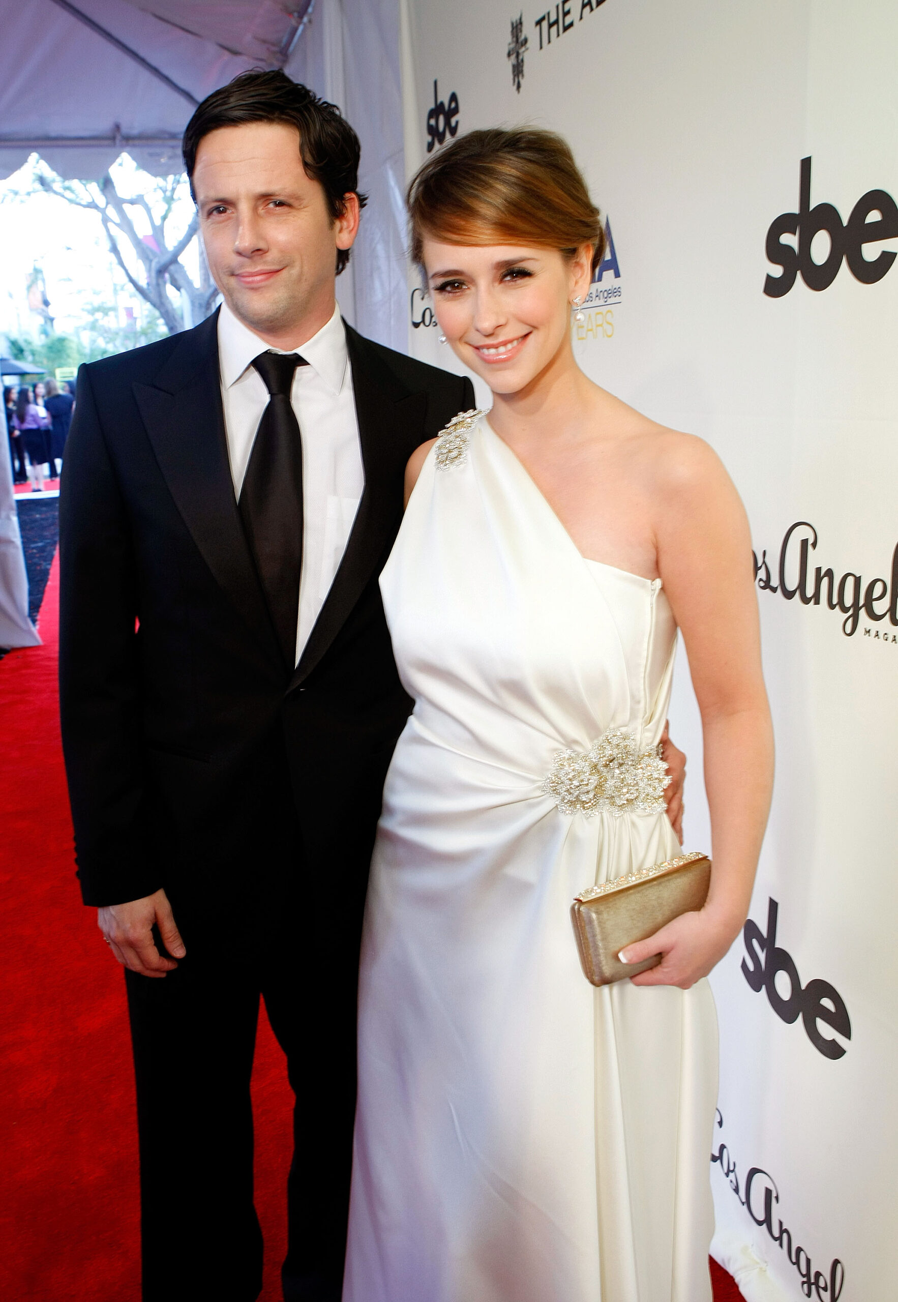 Ross McCall and Jennifer Love Hewitt arrive at 