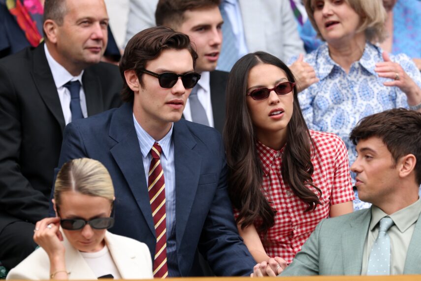 Actor, Louis Patridge and musician, Olivia Rodrigo are seen in the Royal Box prior to the Ladies' Singles second round match between Aryna Sabalenka and Marie Bouzkova of Czechia on day three of The Championships Wimbledon 2025 at All England Lawn Tennis and Croquet Club on July 02, 2025 in London, England.